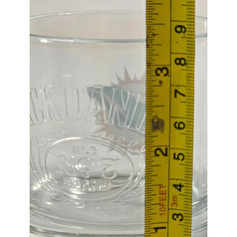 Jack Daniel's promotional NFL rocks glasses featuring the Miami Dolphins logo